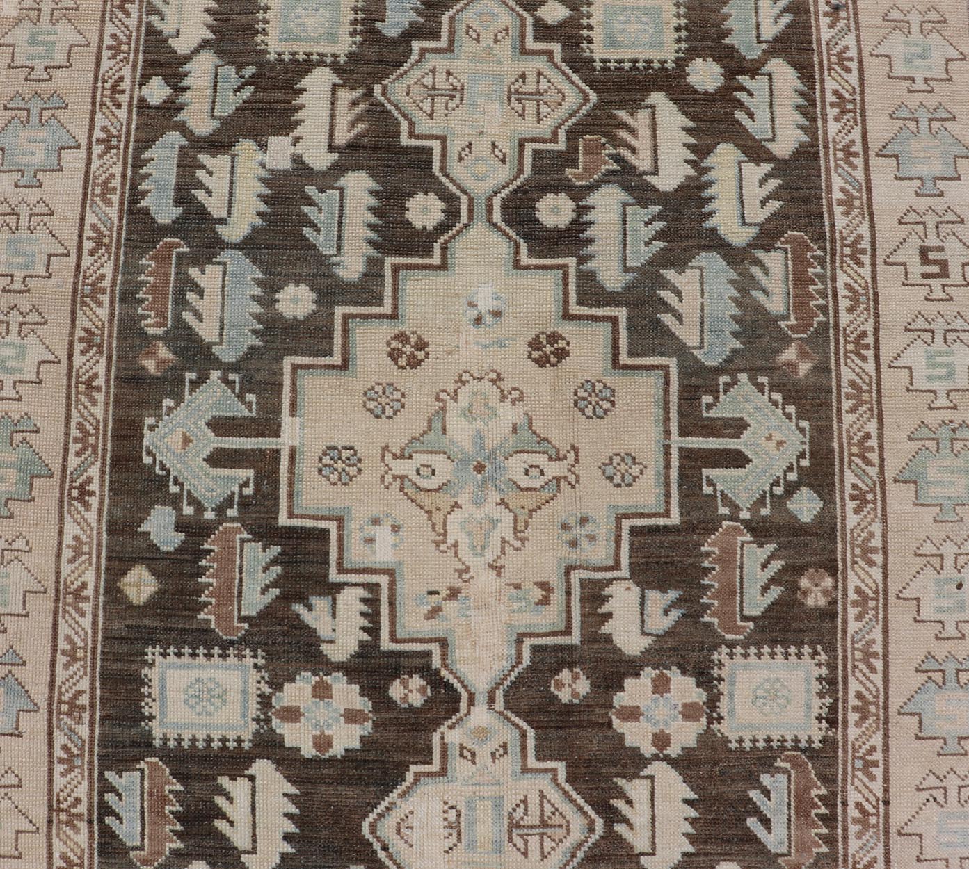 Antique Kazak Runner with Geometric Design And Medallions On A Brown Field Country of Origin: Caucasus Type: Kazak Design: medallion, Sub - Geometric, Early 20th century, Keivan Woven Arts; rug S12 - 0519 Measures: 3'2 x 8'7 This piece was h... - Keivan Woven ArtsS12 - 0519 - 3263Rug