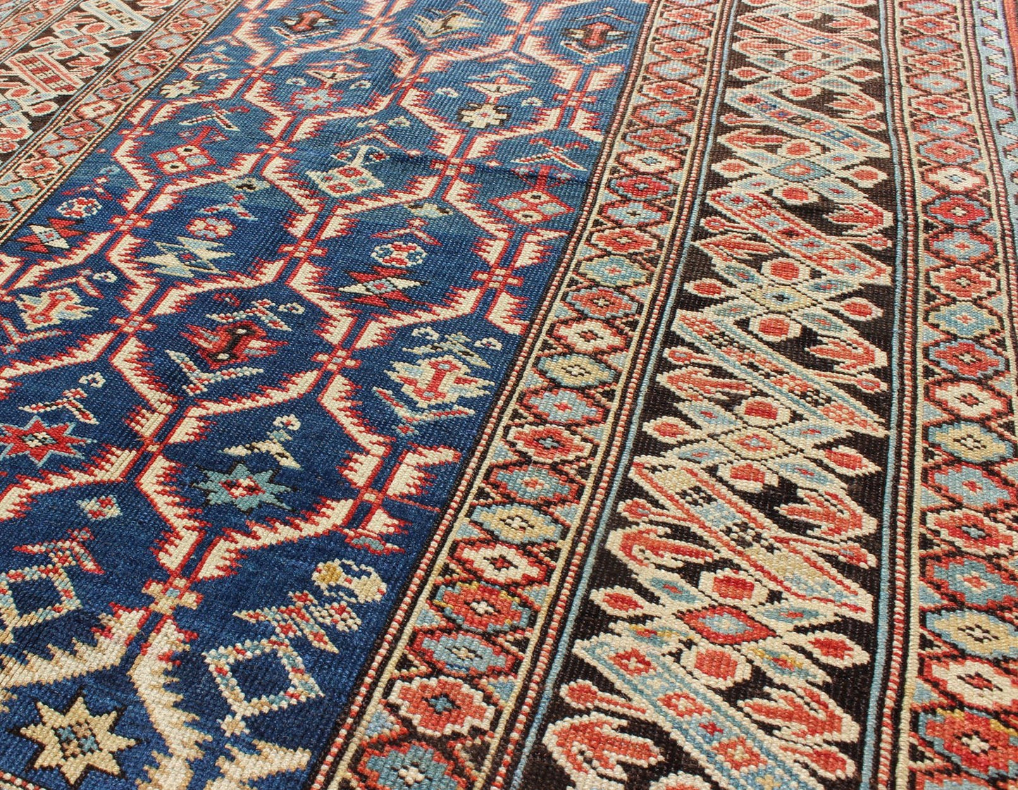 Amazing Antique Caucasian Chi Chi in Medium Blue Background and Brown Border Measures: 3'6 x 4'10. This Gorgeous 19th Century Chi Chi rug displays an amazing color combination of medium blue, Green, Brown and rust colors, featuring a repeat... - Keivan Woven ArtsS12 - 0609 - 3273Rug