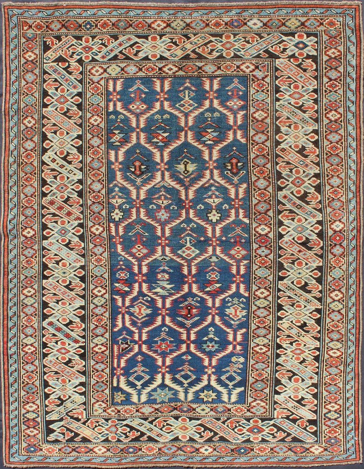 Amazing Antique Caucasian Chi Chi in Medium Blue Background and Brown Border Measures: 3'6 x 4'10. This Gorgeous 19th Century Chi Chi rug displays an amazing color combination of medium blue, Green, Brown and rust colors, featuring a repeat... - Keivan Woven ArtsS12 - 0609 - 3273Rug