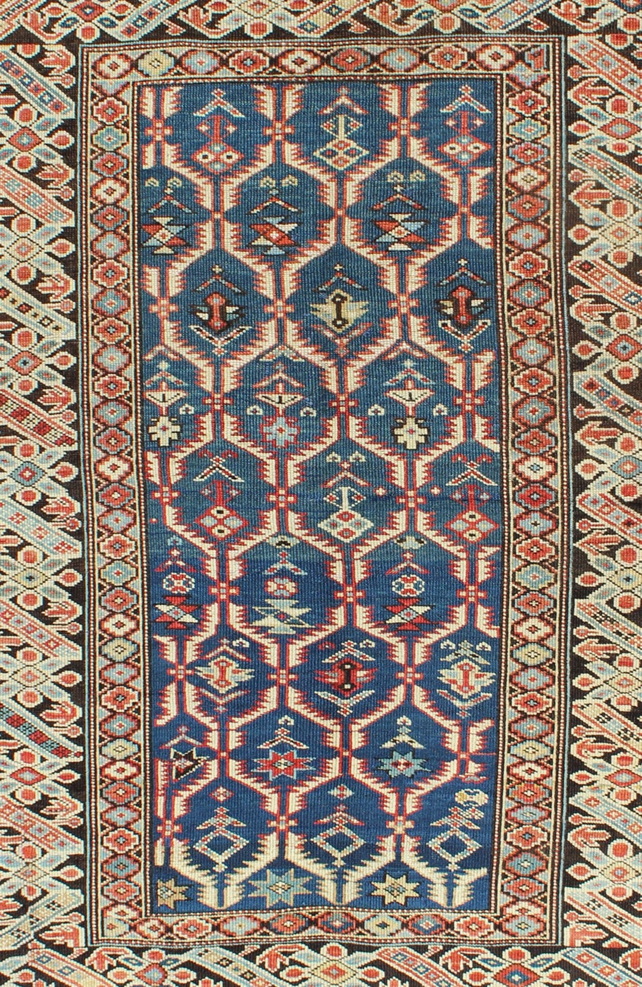 Amazing Antique Caucasian Chi Chi in Medium Blue Background and Brown Border Measures: 3'6 x 4'10. This Gorgeous 19th Century Chi Chi rug displays an amazing color combination of medium blue, Green, Brown and rust colors, featuring a repeat... - Keivan Woven ArtsS12 - 0609 - 3273Rug