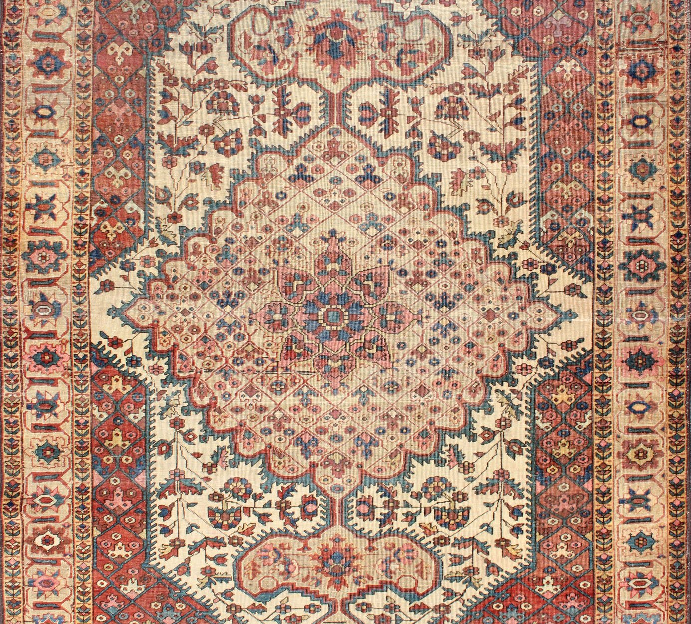 Antique Feraghan Sarouk Rug in Ivory Background, Brown Red, Camel, Salmon and Teal. Antique Ferahan Sarouk Rug in Ivory Background, Red Brown, Camel and Teal, Green and Denim Blue. kwaRugs / S12 - 0616. This outstanding antique Farahan Sarouk car... - Keivan Woven ArtsS12 - 0616 - 3301Rug