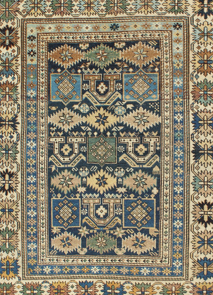 Antique Hand Knotted Caucasian Shirvan Rug in Blue with Tribal Design Measures: 3'3'' x 4'5''. The field of this Caucasian piece features all - over tribal motifs and shapes decorated with small flowers and square designs, alternating c... - Keivan Woven ArtsS12 - 0912 - 3670Rug