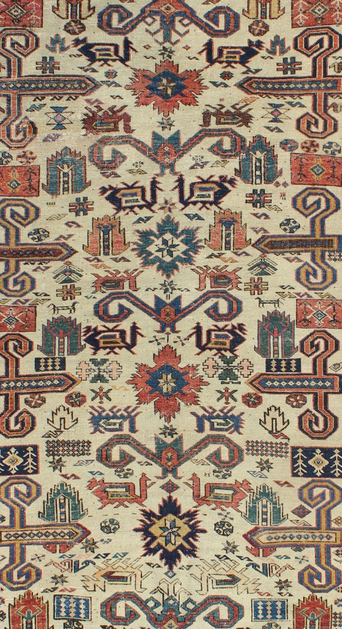 Antique Caucasian Prepedil Rug - This magnificent antique Caucasian Prepedil rug displays a superb Caucasian arabesque accompanied by symbolic devices and protective borders. Crenellated fence guard - bands wind around the perimeter of the field along with... - Keivan Woven ArtsS12 - 0913 - 3674Rug