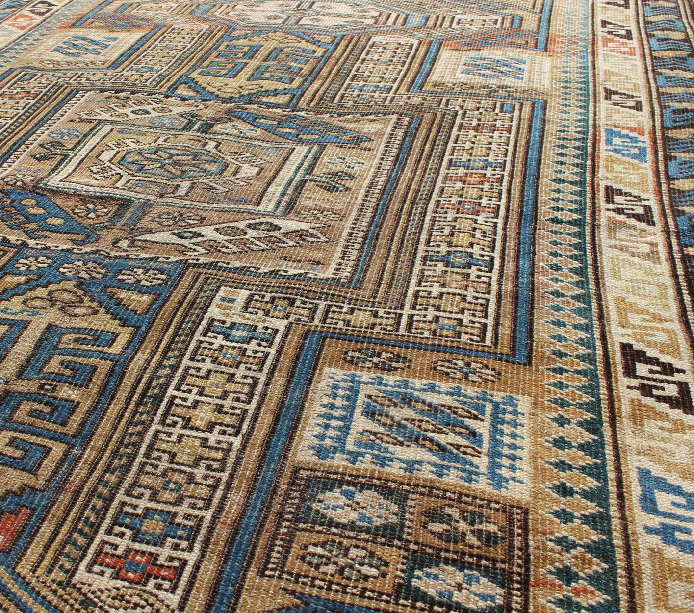 Antique Caucasian Kazak Rug with Geometric Star, Cross and Greek Key Motifs This stunning late 19th century Kazak rug from the Caucasus region displays magnificent, interconnected, geometric medallions and an all - over geometric design. A dynamic... - Keivan Woven ArtsS12 - 1003 - 3748Rug