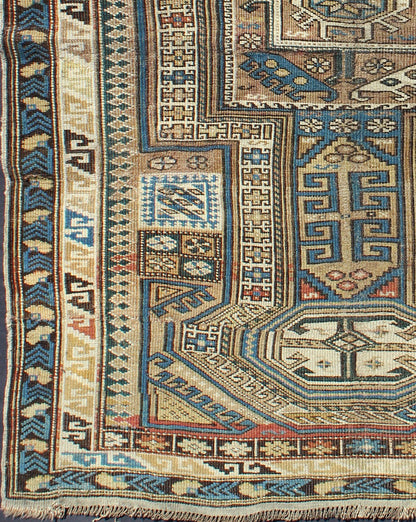 Antique Caucasian Kazak Rug with Geometric Star, Cross and Greek Key Motifs This stunning late 19th century Kazak rug from the Caucasus region displays magnificent, interconnected, geometric medallions and an all - over geometric design. A dynamic... - Keivan Woven ArtsS12 - 1003 - 3748Rug