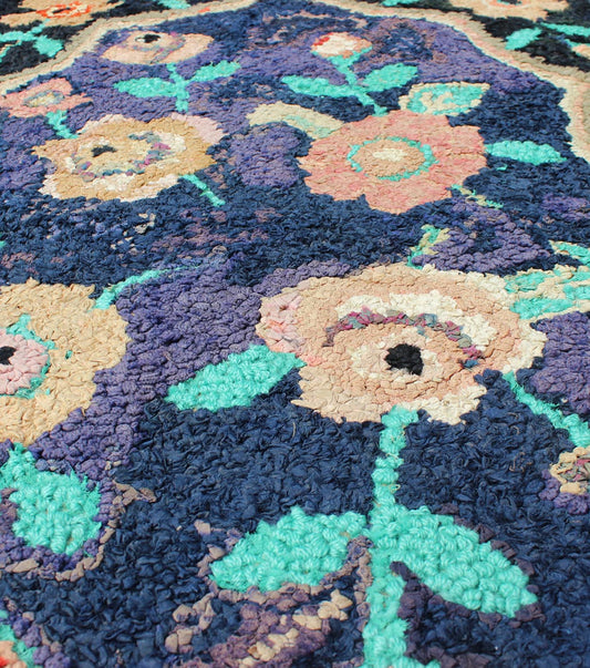 American Hooked Rug in Floral Pattern With Medallion on Purple/Blue, Black. Keivan Woven Arts - Antique American hooked rug with purple and black background, rug S12 - 1204, country of origin / type: United States / Hooked, circa 1940 Ingenious... - Keivan Woven ArtsS12 - 1204 - 4064Rug
