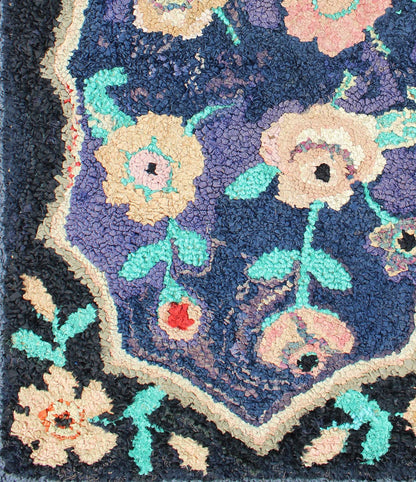 American Hooked Rug in Floral Pattern With Medallion on Purple/Blue, Black. Keivan Woven Arts - Antique American hooked rug with purple and black background, rug S12 - 1204, country of origin / type: United States / Hooked, circa 1940 Ingenious... - Keivan Woven ArtsS12 - 1204 - 4064Rug