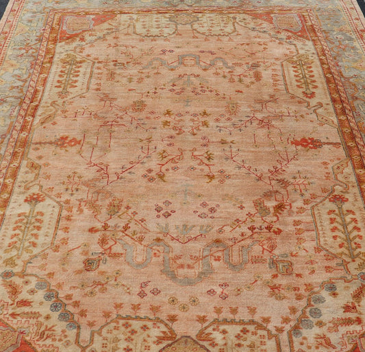 This large late 19th Century Antique Turkish Oushak Rug displays a colorful palette in Salmon, Green, pink, Yellow, Orange, cream, red, Antique Oushak, Keivan Woven Arts; rug S12 - 1213, Country of Origin: Turkey Type: Antique Oushak Design: Floral, Sub - ... - Keivan Woven ArtsS12 - 1213 - 3988Rug