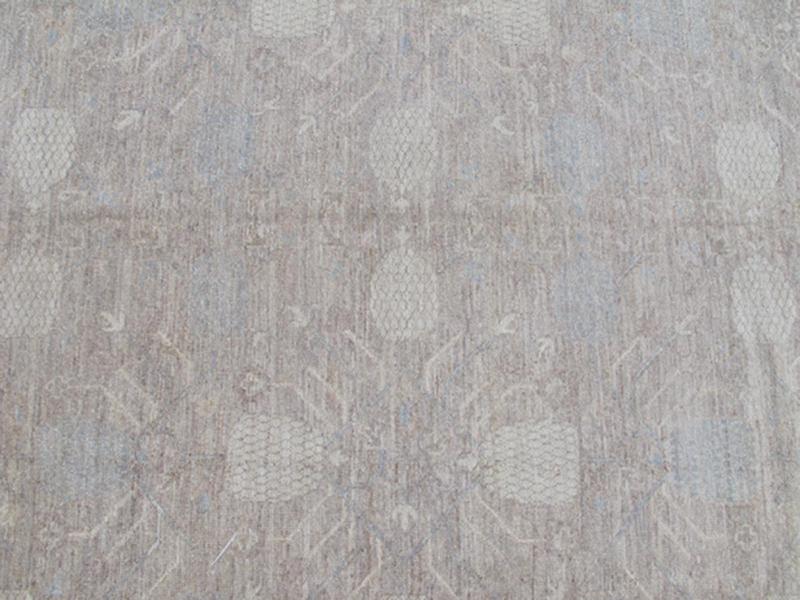 This Khotan features an all - over design flanked by a repeating pattern in the border. The entirety of the piece is rendered in light tones, which makes it a versatile rug, well - suited for a variety of interiors. Colors include light blue, cream and sof... - Keivan Woven ArtsSK - 1319 - 5201Rug