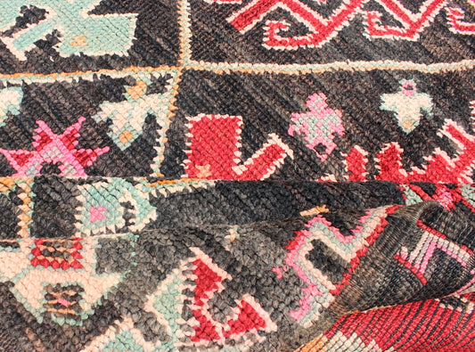 Geometric Tribal Vintage Moroccan Rug in Black, Red, Green and Pink. Keivan Woven Arts / Mid 20th Century / Morocco / Rug SK - 373 With bold diamond and star medallions set on black background, this unique Moroccan displays an array of unexpected col... - Keivan Woven ArtsSK - 373 - 3994