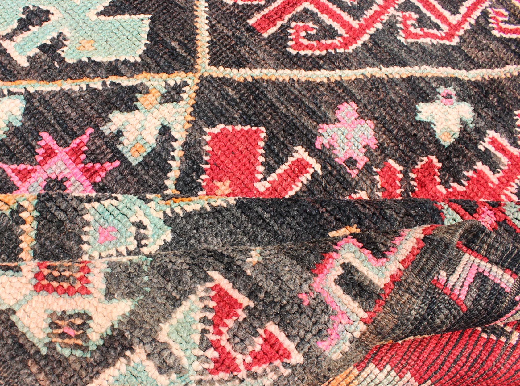 Geometric Tribal Vintage Moroccan Rug in Black, Red, Green and Pink. Keivan Woven Arts / Mid 20th Century / Morocco / Rug SK - 373 With bold diamond and star medallions set on black background, this unique Moroccan displays an array of unexpected col... - Keivan Woven ArtsSK - 373 - 3994Rug