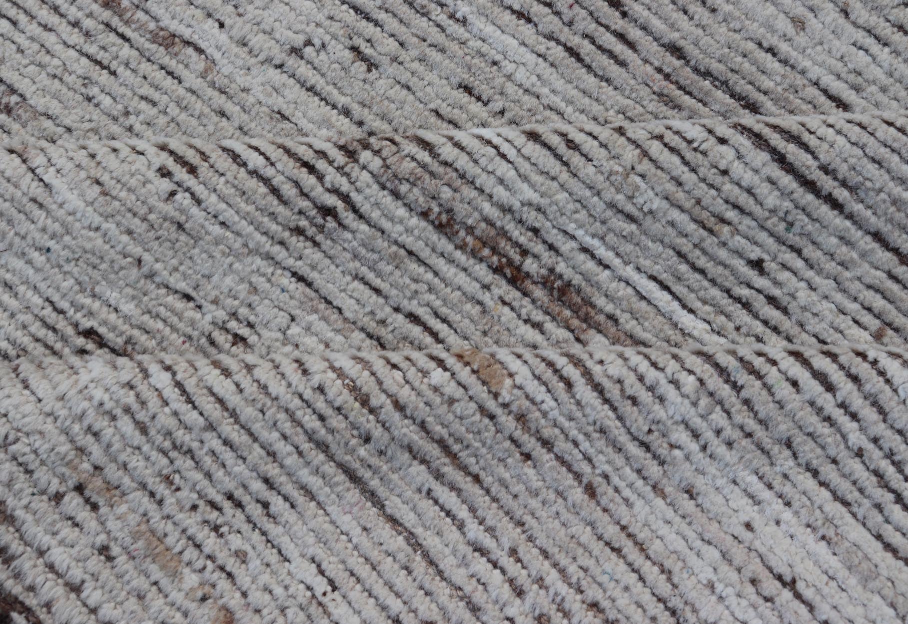 Minimalist Modern with Solid Off White Background in Textures Wool. As part of our modern casual collection, this distressed modern rug with Solid design is inspired by Moroccan rugs. The textured pile is white and off white wool and underneath the ... - Keivan Woven ArtsSNK - 1359 - 21505Rug
