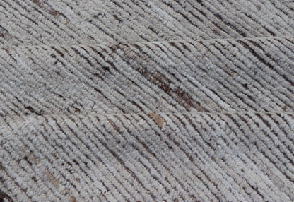 Minimalist Modern with Solid Off White Background in Textures Wool. As part of our modern casual collection, this distressed modern rug with Solid design is inspired by Moroccan rugs. The textured pile is white and off white wool and underneath the ... - Keivan Woven ArtsSNK - 1359 - 21505Rug