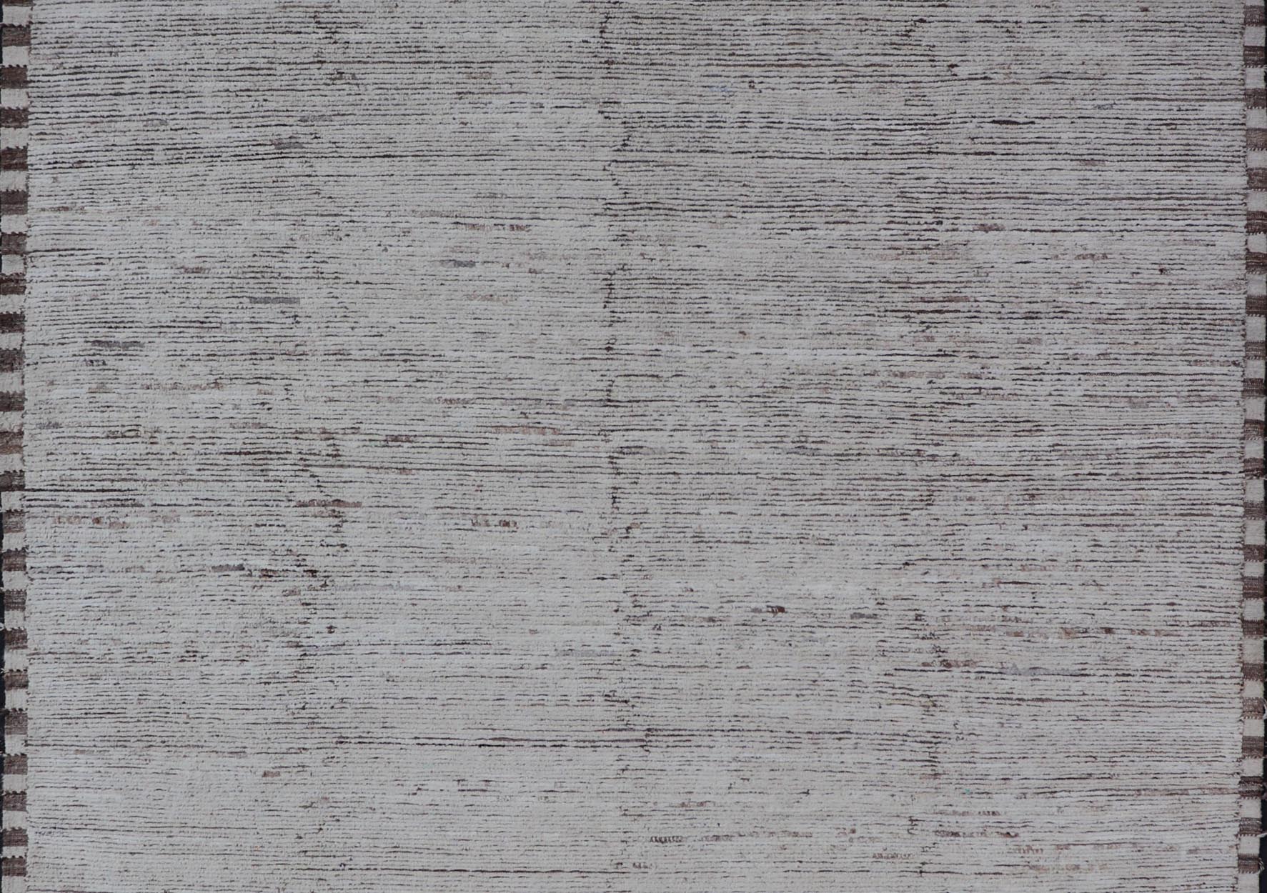 Minimalist Modern with Solid Off White Background in Textures Wool. As part of our modern casual collection, this distressed modern rug with Solid design is inspired by Moroccan rugs. The textured pile is white and off white wool and underneath the ... - Keivan Woven ArtsSNK - 1359 - 21505Rug