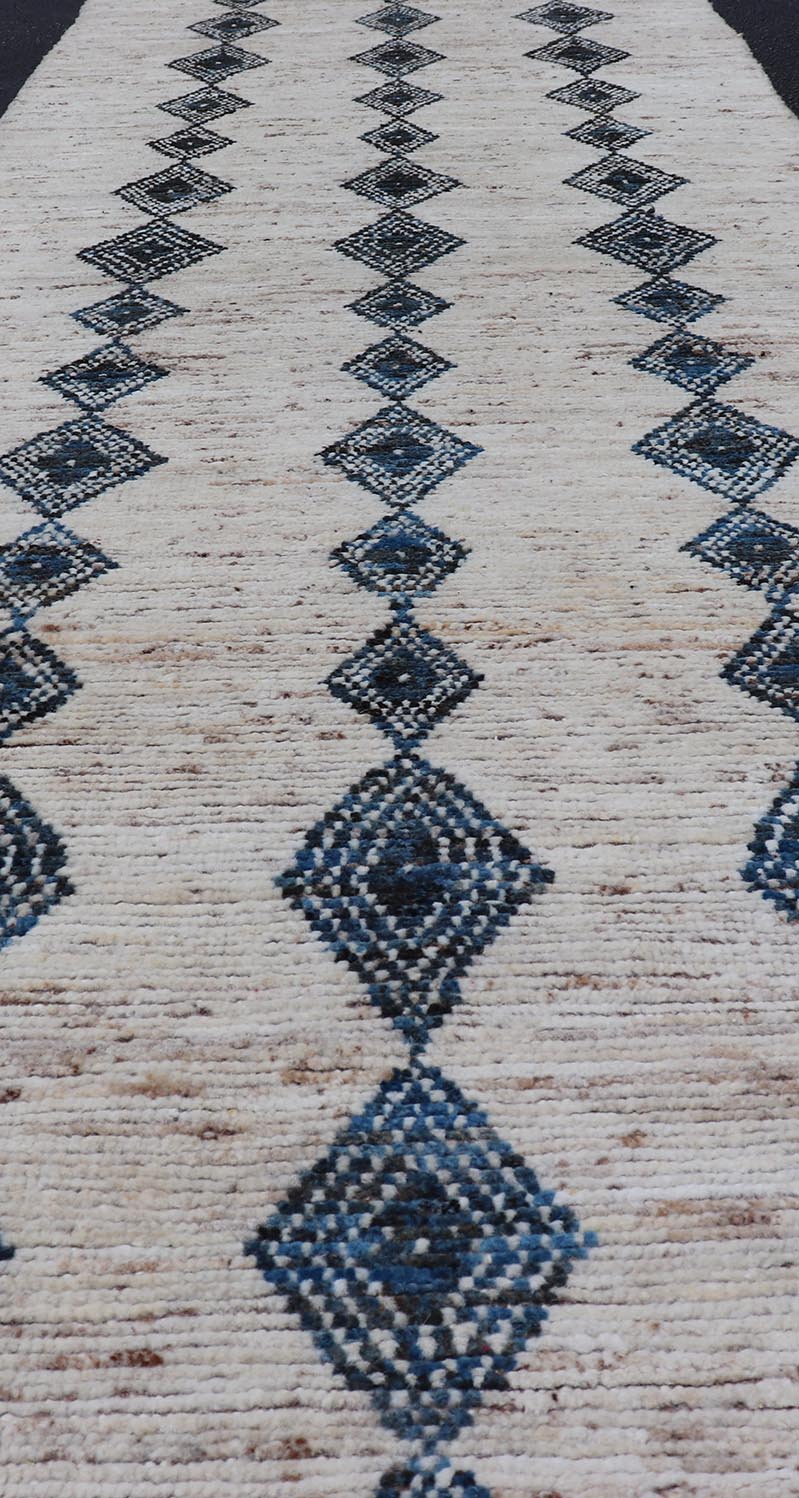 Modern Hand - Knotted Runner in Wool with Diamond Design in Blue and Ivory. Keivan Woven Arts; rug SNK - 2270, country of origin / type: Afghanistan / Modern Casual, circa Early - 21th Century. Measures: 3'1 x 10'1 This modern casual tribal runner has... - Keivan Woven ArtsSNK - 2270 - 24366