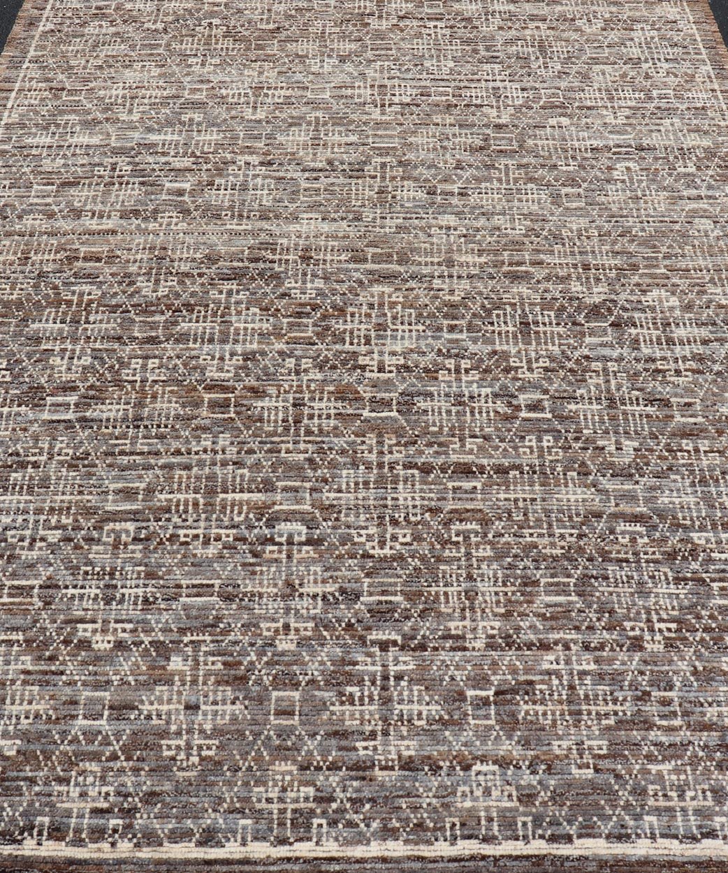 Modern Rug in Wool with All - Over Geometric Tribal Design in Brown and Ivory. Keivan Woven Arts /rug SNK - 2307, country of origin / type: Afghanistan / Modern Casual, circa Early - 21th Century. Measures: 6'10 x 9'7 The rug features a modern all - ov... - Keivan Woven ArtsSNK - 2307 - 24324Rug