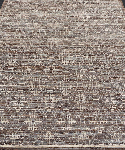 Modern Rug in Wool with All - Over Geometric Tribal Design in Brown and Ivory. Keivan Woven Arts /rug SNK - 2307, country of origin / type: Afghanistan / Modern Casual, circa Early - 21th Century. Measures: 6'10 x 9'7 The rug features a modern all - ov... - Keivan Woven ArtsSNK - 2307 - 24324Rug