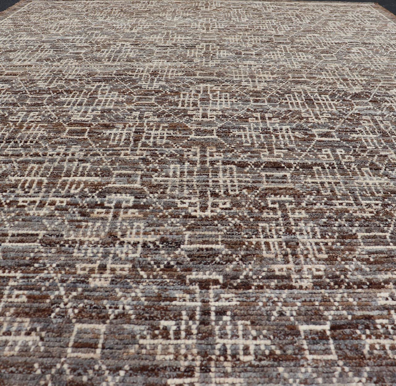 Modern Rug in Wool with All - Over Geometric Tribal Design in Brown and Ivory. Keivan Woven Arts /rug SNK - 2307, country of origin / type: Afghanistan / Modern Casual, circa Early - 21th Century. Measures: 6'10 x 9'7 The rug features a modern all - ov... - Keivan Woven ArtsSNK - 2307 - 24324Rug