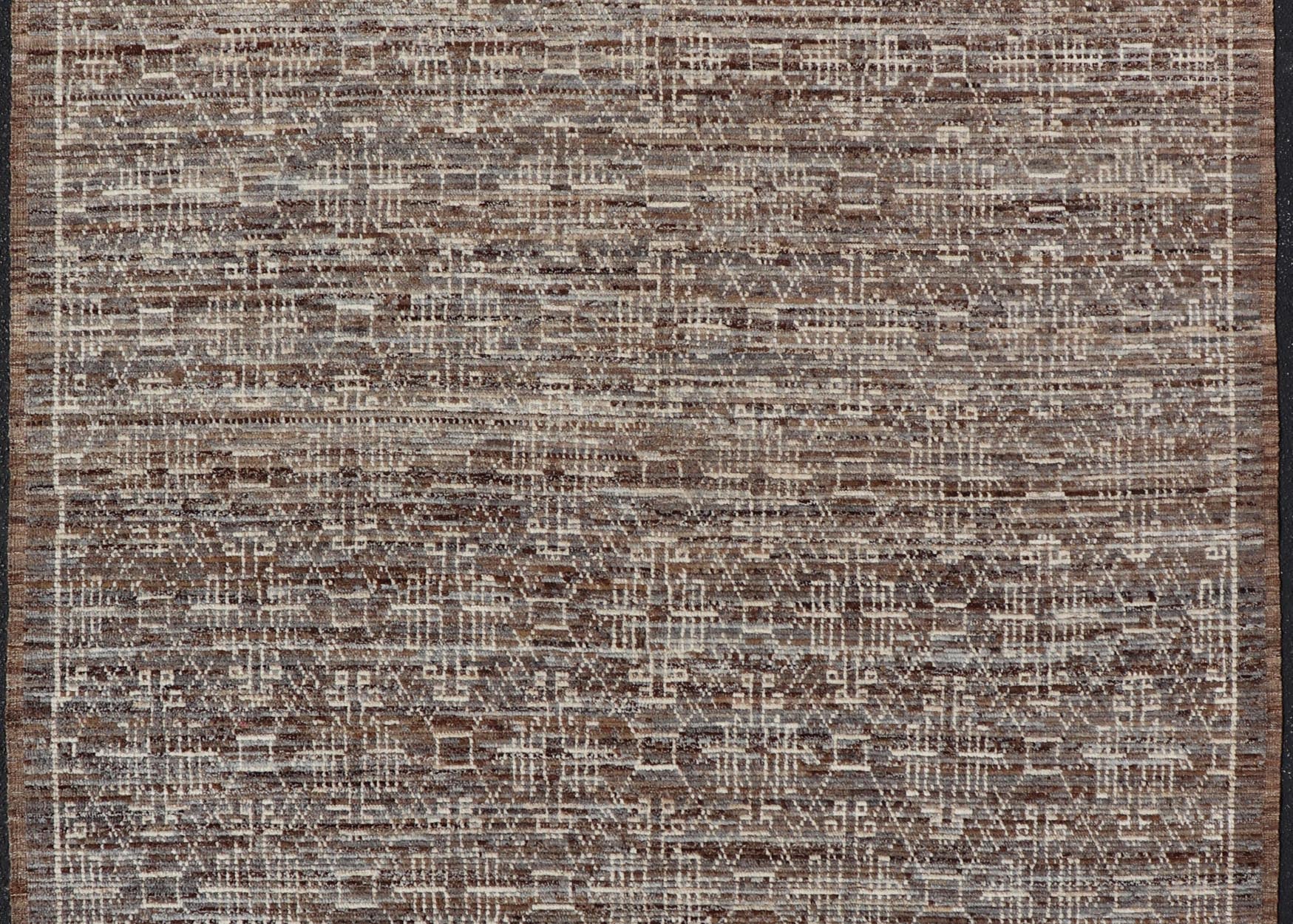 Modern Rug in Wool with All - Over Geometric Tribal Design in Brown and Ivory. Keivan Woven Arts /rug SNK - 2307, country of origin / type: Afghanistan / Modern Casual, circa Early - 21th Century. Measures: 6'10 x 9'7 The rug features a modern all - ov... - Keivan Woven ArtsSNK - 2307 - 24324Rug
