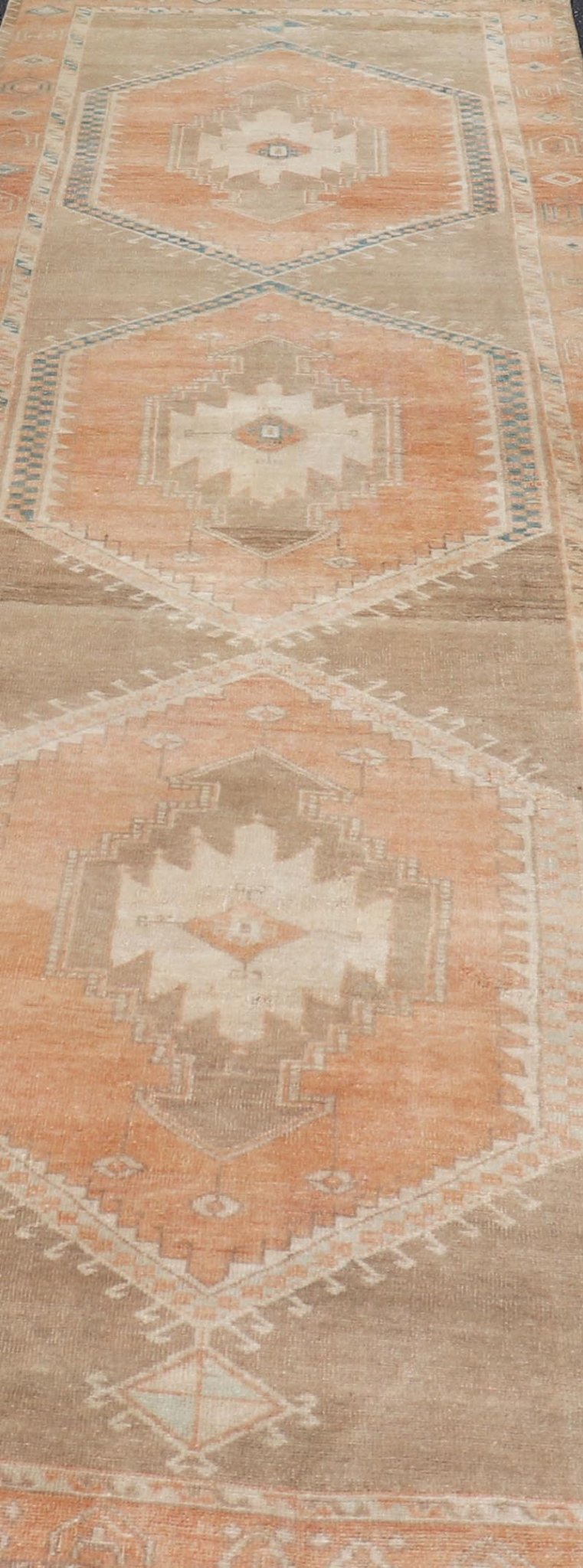 Measures: 3'6 x 13'0 Keivan Woven Arts Oushak Runner With Tribal and Geometric Motifs. Keivan Woven Arts / rug/SNK - 300, country of origin / type: Turkey / Oushak, circa 1940 This vintage runner features an assortment of tribal and geometric meda... - Keivan Woven ArtsSNK - 300 - 27658Rug