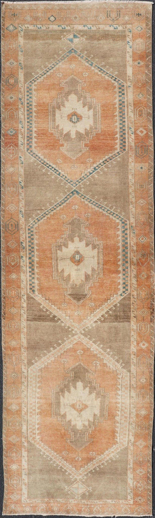Measures: 3'6 x 13'0 Keivan Woven Arts Oushak Runner With Tribal and Geometric Motifs. Keivan Woven Arts / rug/SNK - 300, country of origin / type: Turkey / Oushak, circa 1940 This vintage runner features an assortment of tribal and geometric meda... - Keivan Woven ArtsSNK - 300 - 27658Rug