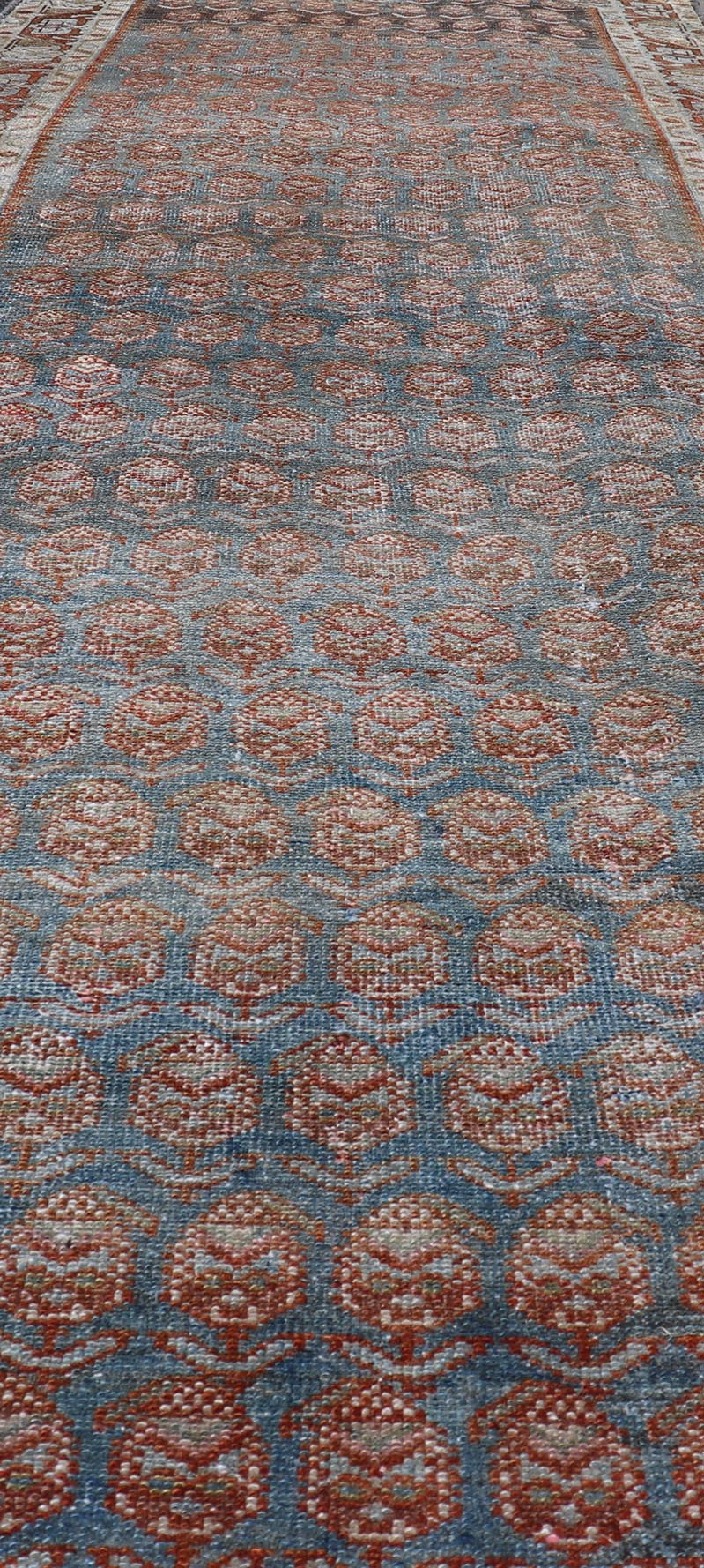 Long Persian Malayer Runner with Paisley and Botanical Motifs in Blue and Green This magnificent antique long Persian Malayer runner, of an impressive size, bears a beautiful, all - over sub - geometric design paired with a delightful palette of var... - Keivan Woven ArtsSUS - 111 - 8407Rug