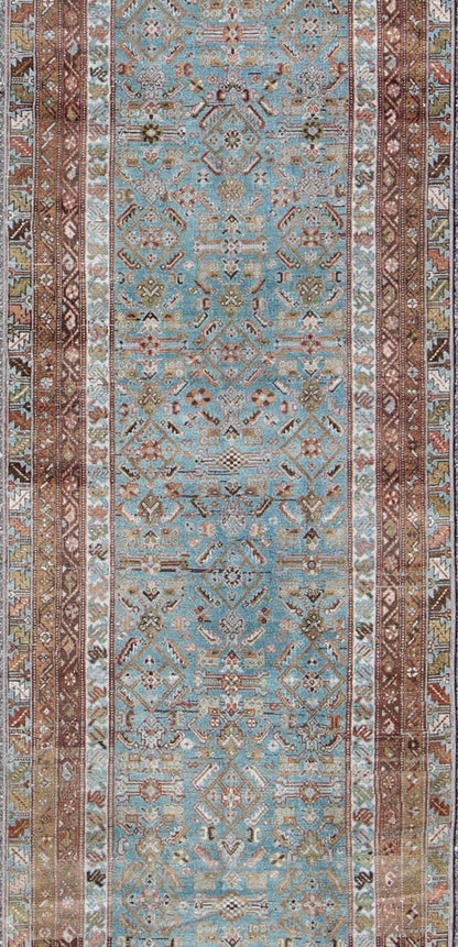 Antique Persian Malayer rug with floral design in blue and brown tones, rug sus - 1803 - 332, country of origin / type: Iran / Malayer, circa 1910 This Persian Malayer runner from early 20th century Iran features an all - over geometric floral pattern... - Keivan Woven ArtsSUS - 1803 - 332 - 9635Rug