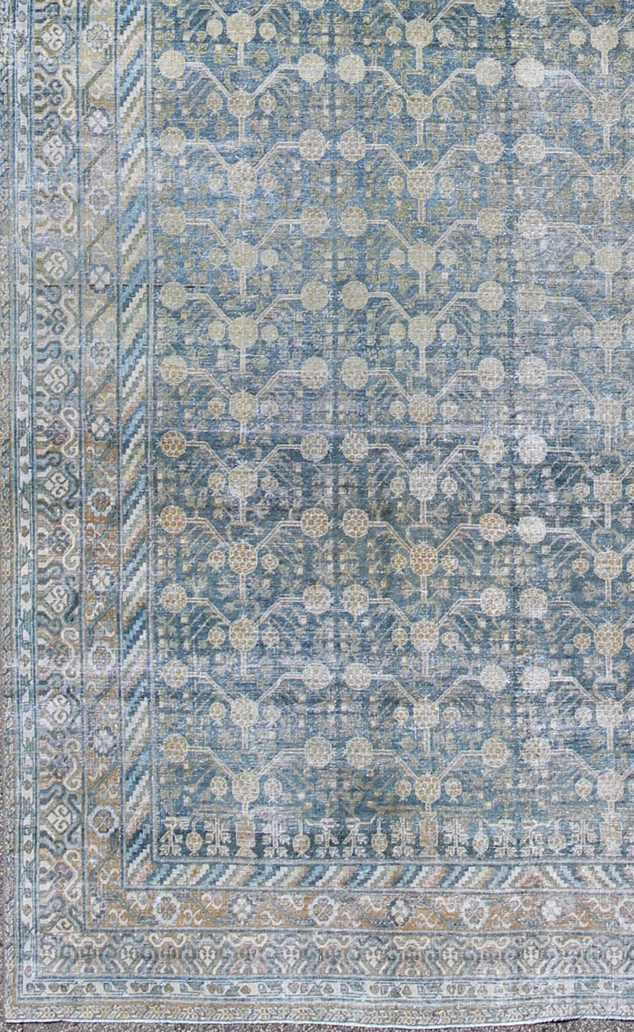 Antique Khotan rug with blue all - over design of blossoms and flowers, large Khotan from Turkestan rug sus - 1803 - 387, country of origin / type: Turkestan / Khotan, circa 1910 This attractive antique Khotan rug (circa 1910) is a spectacular testame... - Keivan Woven ArtsSUS - 1803 - 387 - 9639Rug