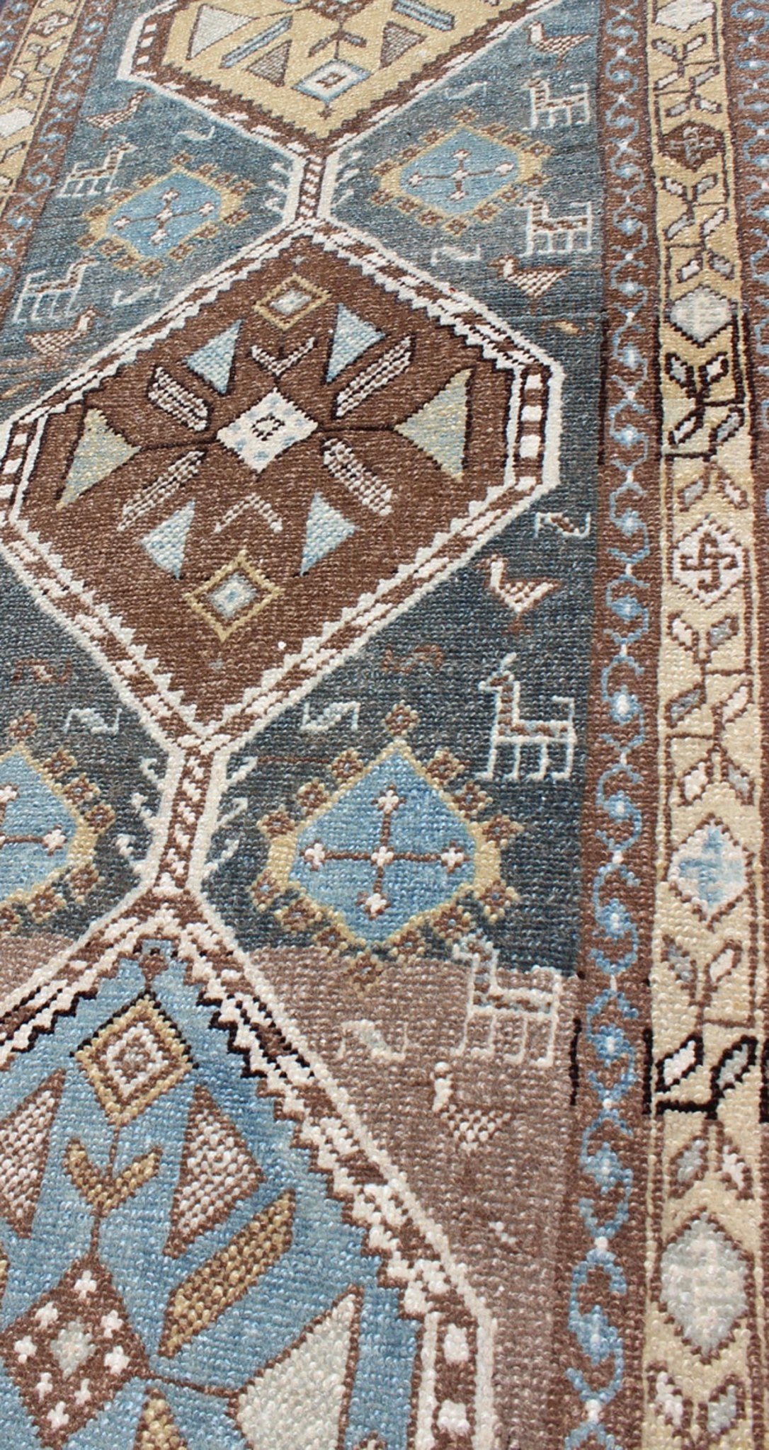 Persian Heriz antique Gallery rug with sub - geometric Medallion Design in colorful tones including blue, nude, and brown, rug sus - 1807 - 215, country of origin / type: Iran / Heriz, circa 1920 This antique Persian Heriz runner, from northwest Iran,... - Keivan Woven ArtsSUS - 1807 - 215 - 10120Rug
