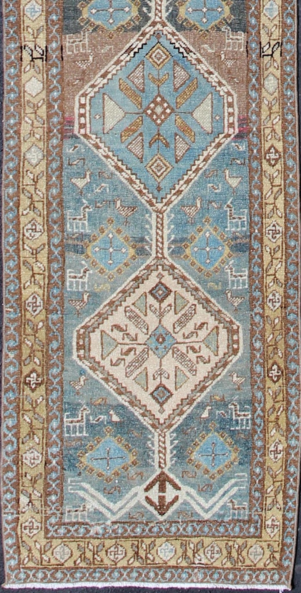 Persian Heriz antique Gallery rug with sub - geometric Medallion Design in colorful tones including blue, nude, and brown, rug sus - 1807 - 215, country of origin / type: Iran / Heriz, circa 1920 This antique Persian Heriz runner, from northwest Iran,... - Keivan Woven ArtsSUS - 1807 - 215 - 10120Rug