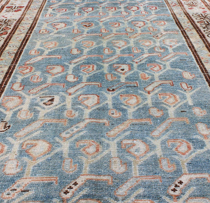 Persian Malayer antique runner with all - over geometric design in light blue and red, rug sus - 1807 - 262, country of origin / type: Iran / Mahal, circa 1920. This antique Persian Malayer runner, circa early 20th century, relies heavily on exquisite... - Keivan Woven ArtsSUS - 1807 - 262 - 10139Rug