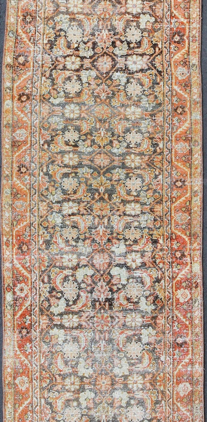 All - over floral blossom design long Mahal runner antique from Persia in charcoal and red tones, rug sus - 1807 - 287, country of origin / type: Iran / Mahal, circa 1920. This antique Persian Mahal runner, circa early 20th century, relies heavily on ... - Keivan Woven ArtsSUS - 1807 - 287 - 10157Rug