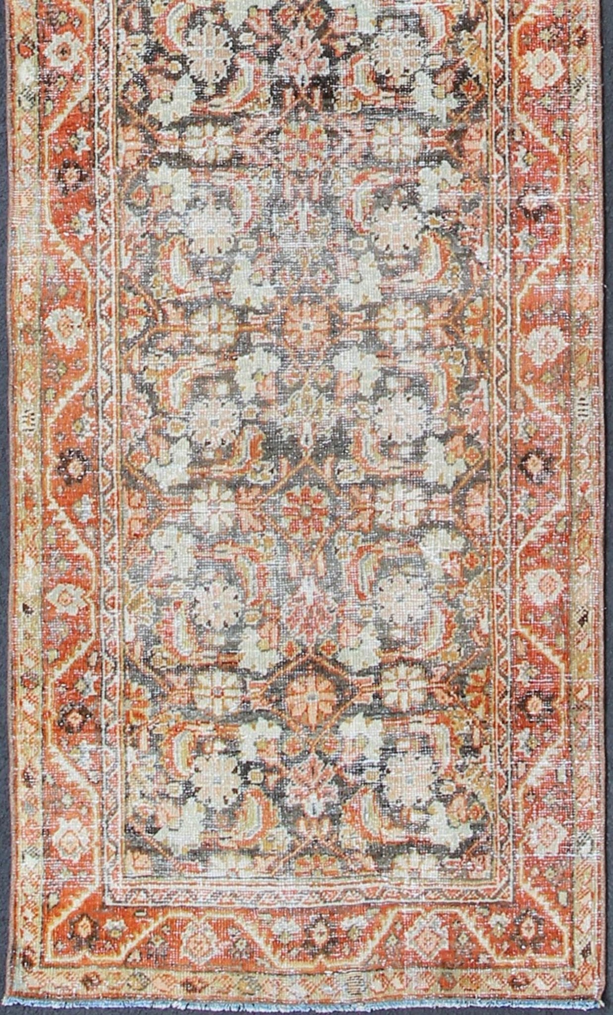 All - over floral blossom design long Mahal runner antique from Persia in charcoal and red tones, rug sus - 1807 - 287, country of origin / type: Iran / Mahal, circa 1920. This antique Persian Mahal runner, circa early 20th century, relies heavily on ... - Keivan Woven ArtsSUS - 1807 - 287 - 10157Rug