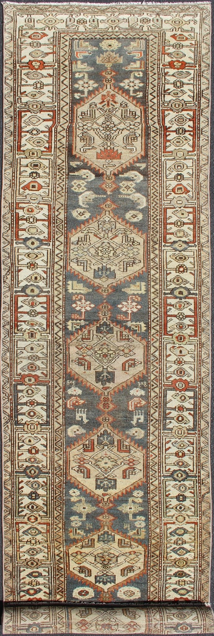 Long Persian Kurdish Runner with Medallion Design in Charcoal, Ivory and Red Antique Persian Kurdish long runner with tribal medallions, rug SUS - 1908 - 115, country of origin / type: Iran or Kurdish, circa 1900. Long Persian Kurdish runner in char... - Keivan Woven ArtsSUS - 1908 - 115 - 11529Rug