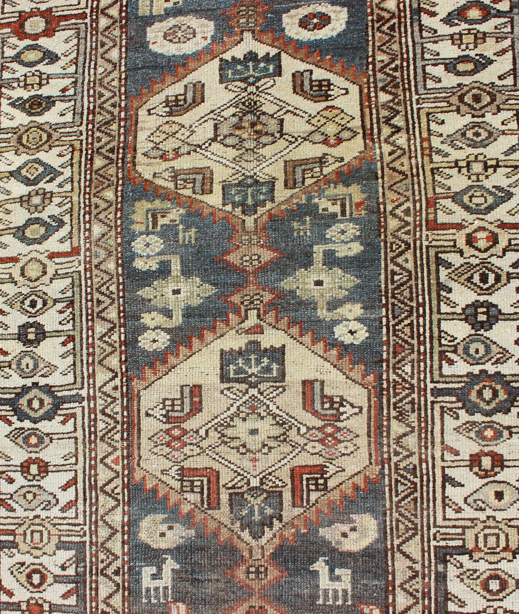 Long Persian Kurdish Runner with Medallion Design in Charcoal, Ivory and Red Antique Persian Kurdish long runner with tribal medallions, rug SUS - 1908 - 115, country of origin / type: Iran or Kurdish, circa 1900. Long Persian Kurdish runner in char... - Keivan Woven ArtsSUS - 1908 - 115 - 11529Rug