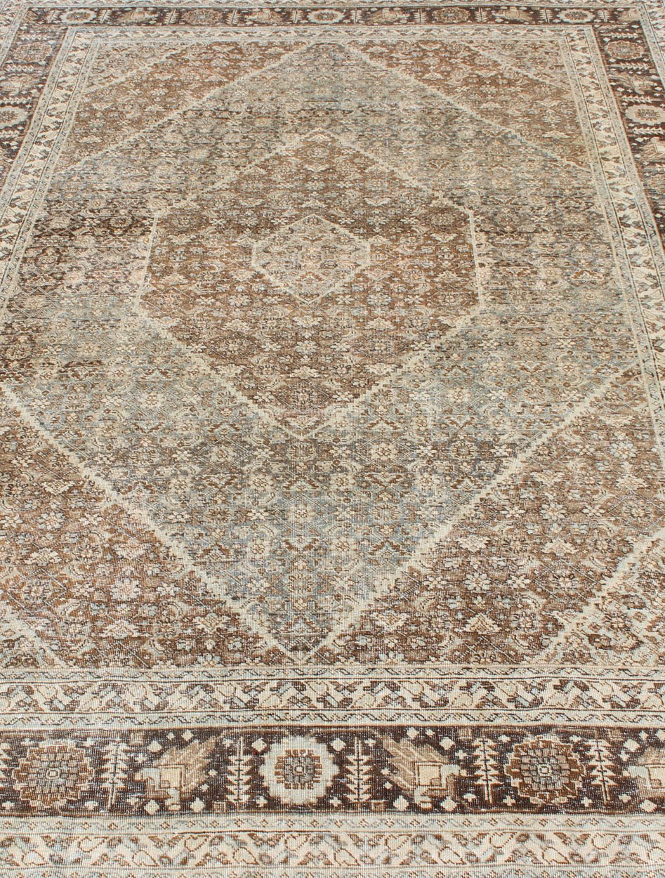 Persian Antique Tabriz with Layered Diamond Geometric Design in Earth Tones Tabriz Antique Rug with Floral Geometrics in Natural Tones, rug SUS - 1908 - 13, country of origin / type: Iran / Tabriz, circa 1920 This antique Tabriz carpet from ... - Keivan Woven ArtsSUS - 1908 - 13 - 11521Rug