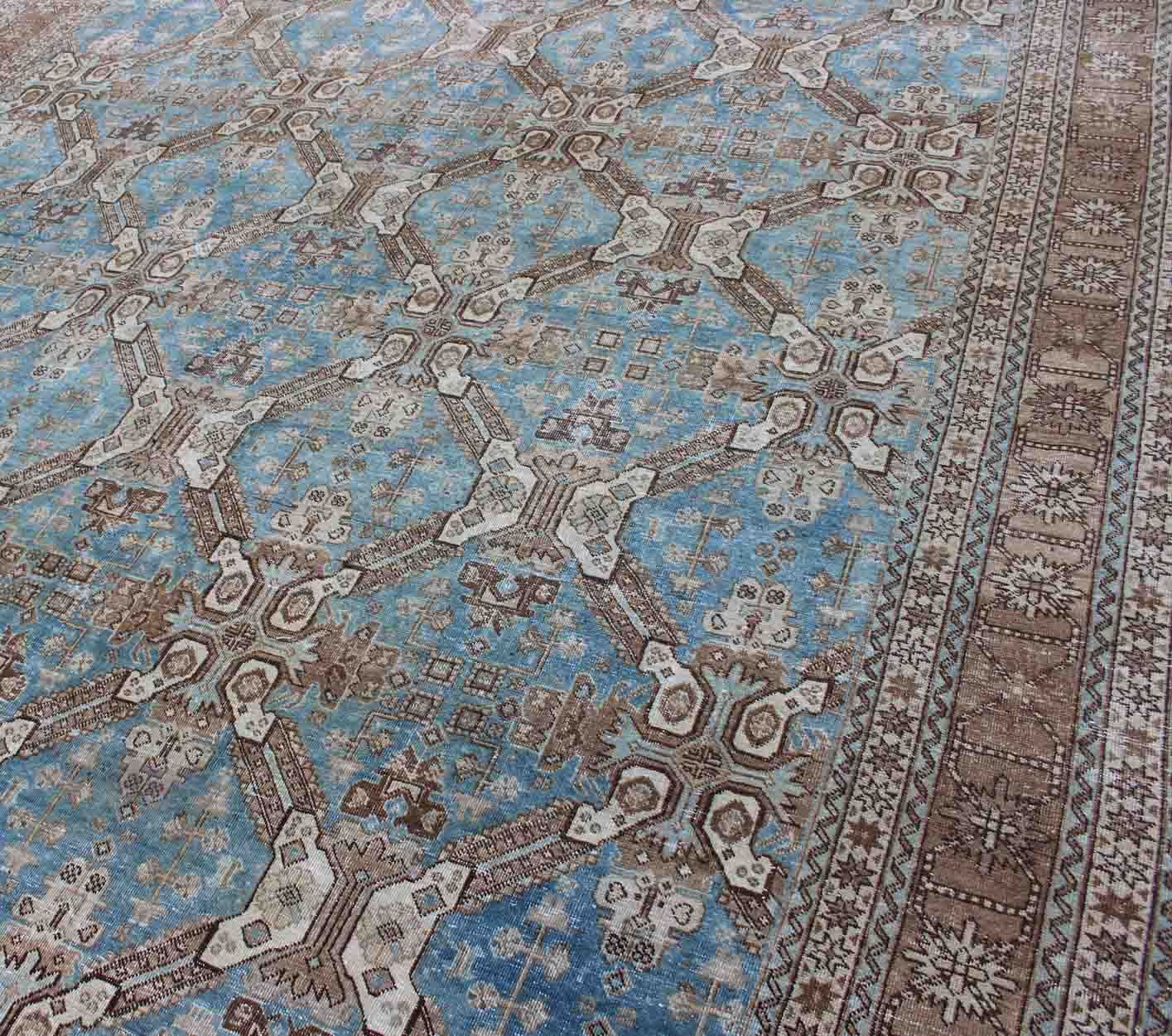 All - Over Pattern Persian Tabriz Rug in Shades of Blue and Taupe Brown, blue, and taupe geometric Persian Tabriz rug, Keivan Woven Arts / rug SUS - 1908 - 22, country of origin / type: Iran / Tabriz, circa 1920 This antique Tabriz carpet from ... - Keivan Woven ArtsSUS - 1908 - 22 - 11625Rug