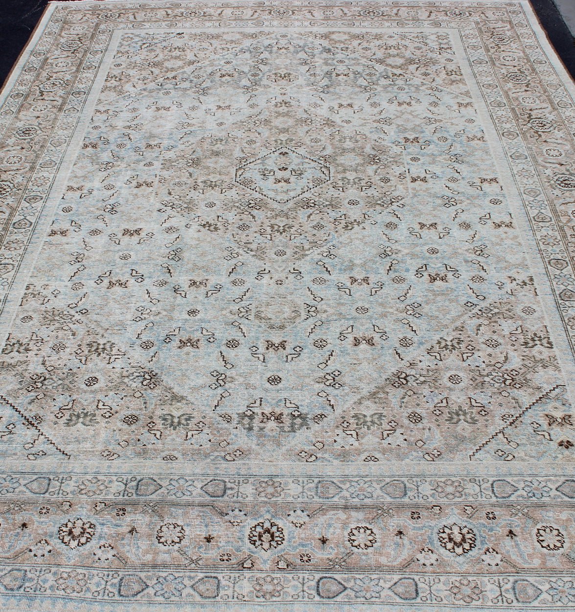 Stylized Persian Antique Tabriz Rug with Medallion Design and Muted Colors Persian Antique Tabriz Rug With Medallion With Herati Design and Muted Colors. Light Blue and Taupe Diamond Medallion Geometric Design Tabriz Rug from Persia. Keivan Wov... - Keivan Woven ArtsSUS - 1908 - 23 - 11629