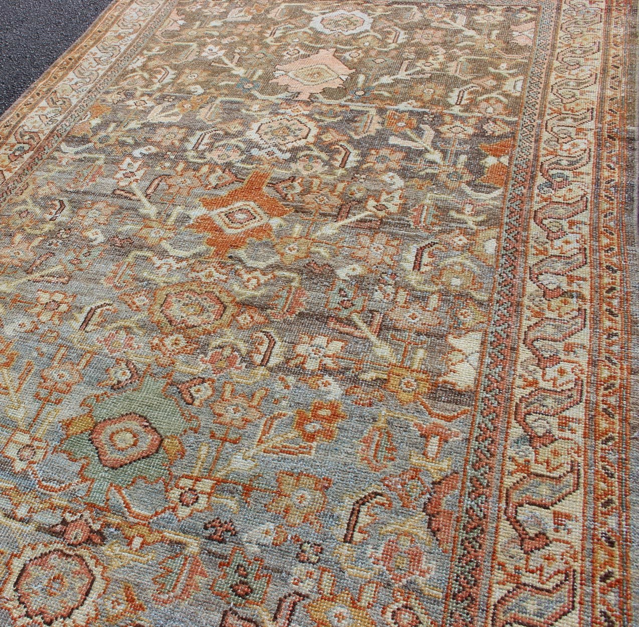 Antique Sultanabad with Muted background and Hints of Red and Orange Persian Sultanabad antique rug with floral design in Gray, green, blue, and red colors with all - over pattern, rug SUS - 2002 - 642, country of origin / type: Iran / Sultanabad circ... - Keivan Woven ArtsSUS - 2002 - 642 - 12701Rug