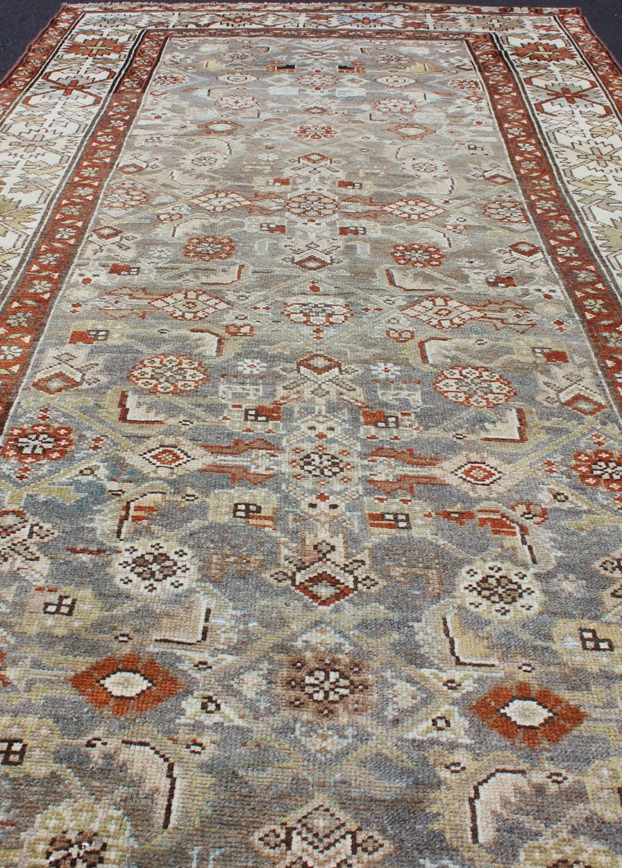 Antique Persian Malayer Rug with All - Over Tribal Design in Gray Background Light gray background and terracotta red guard border, with all - over tribal design,Persian antique Malayer rug, rug SUS - 2007 - 226, country of origin / type: Iran / Malayer... - Keivan Woven ArtsSUS - 2007 - 226 - 13044Rug