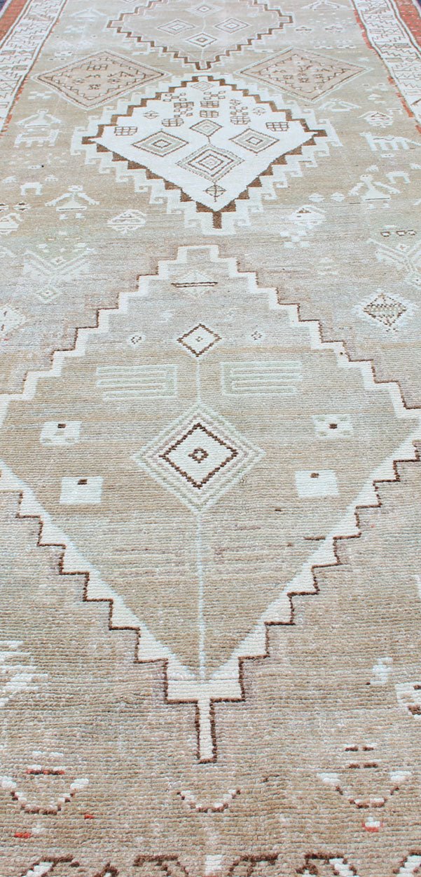 Kurdish Antique Runner with Tribal Design in Light Green, Taupe & Orange - Red Antique Kurdish runner antique with tribal geometric medallions in soft green, and orangey - red border. Traditional medallion Kurdish runner in variety of colors, rug S... - Keivan Woven ArtsSUS - 2009 - 553 - 13272