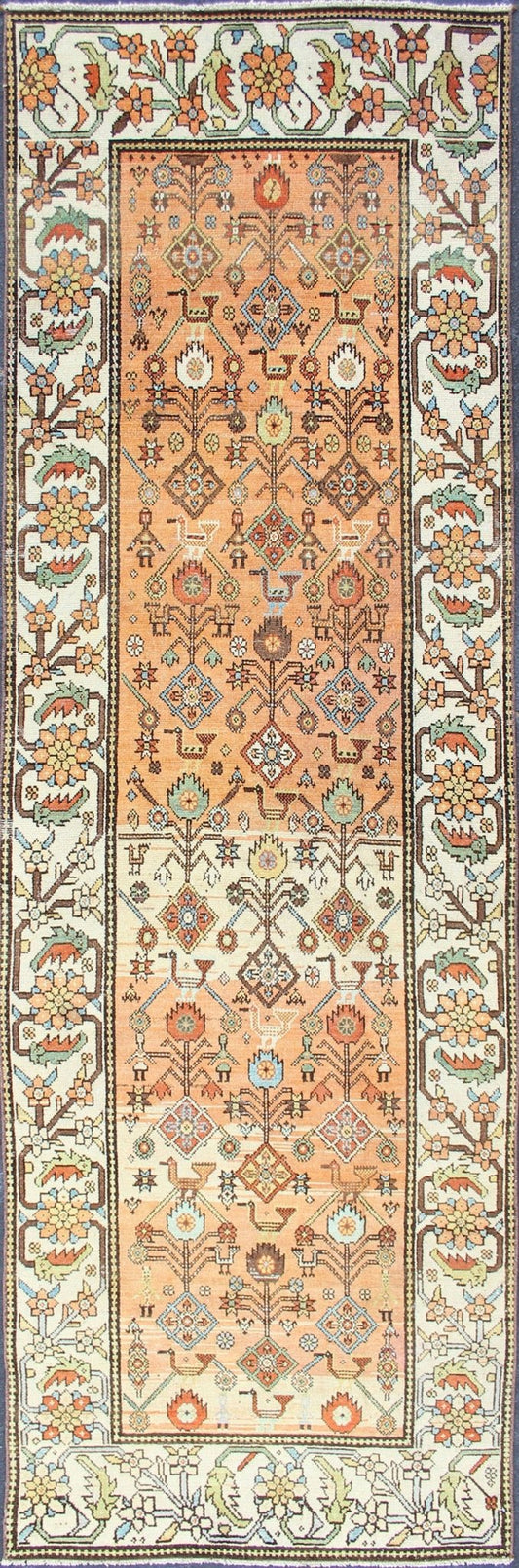 Salmon Background and Earth Tone Antique Bakitari Rug with All - Over Patten All - over Persian with salmon and soft orange Bakitari rug Sub Floral design Bakitari antique rug in light orange/Salmon color tones, rug SUS - 2009 - 652, origin / type: I... - Keivan Woven ArtsSUS - 2009 - 652 - 13276