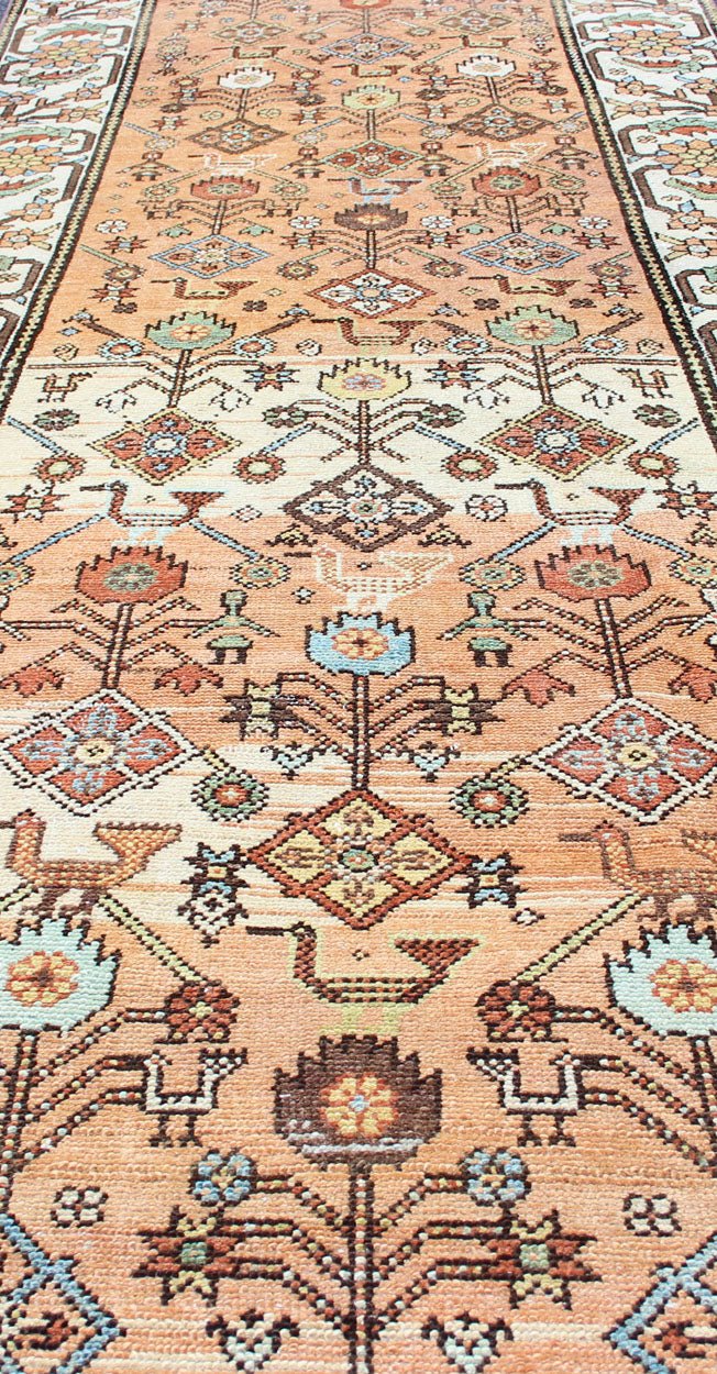 Salmon Background and Earth Tone Antique Bakitari Rug with All - Over Patten All - over Persian with salmon and soft orange Bakitari rug Sub Floral design Bakitari antique rug in light orange/Salmon color tones, rug SUS - 2009 - 652, origin / type: I... - Keivan Woven ArtsSUS - 2009 - 652 - 13276Rug