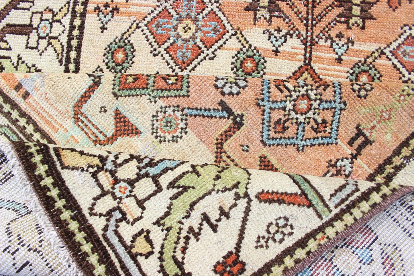 Salmon Background and Earth Tone Antique Bakitari Rug with All - Over Patten All - over Persian with salmon and soft orange Bakitari rug Sub Floral design Bakitari antique rug in light orange/Salmon color tones, rug SUS - 2009 - 652, origin / type: I... - Keivan Woven ArtsSUS - 2009 - 652 - 13276Rug