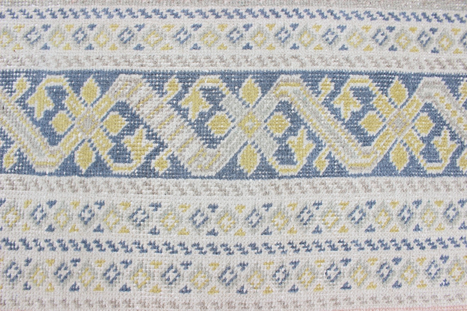 Antique Khotan Rug in Shades of Blue with Gray, L. Pink and Yellow Accents Antique Khotan rug in shades of blue, Taupe, gray, pink, and yellow, rug SUS - 2009 - 75, country of origin / type: Turkestan / Khotan, 1930 This attractive Khotan rug... - Keivan Woven ArtsSUS - 2009 - 75 - 13326
