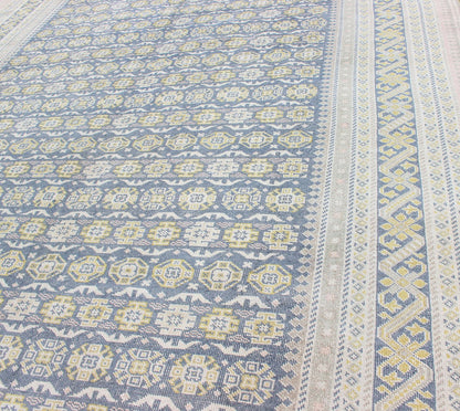 Antique Khotan Rug in Shades of Blue with Gray, L. Pink and Yellow Accents Antique Khotan rug in shades of blue, Taupe, gray, pink, and yellow, rug SUS - 2009 - 75, country of origin / type: Turkestan / Khotan, 1930 This attractive Khotan rug... - Keivan Woven ArtsSUS - 2009 - 75 - 13326Rug