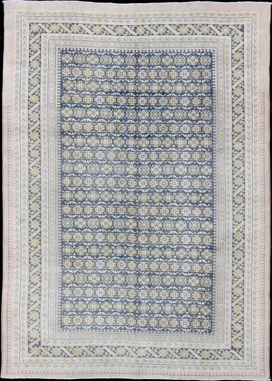 Antique Khotan Rug in Shades of Blue with Gray, L. Pink and Yellow Accents Antique Khotan rug in shades of blue, Taupe, gray, pink, and yellow, rug SUS - 2009 - 75, country of origin / type: Turkestan / Khotan, 1930 This attractive Khotan rug... - Keivan Woven ArtsSUS - 2009 - 75 - 13326Rug