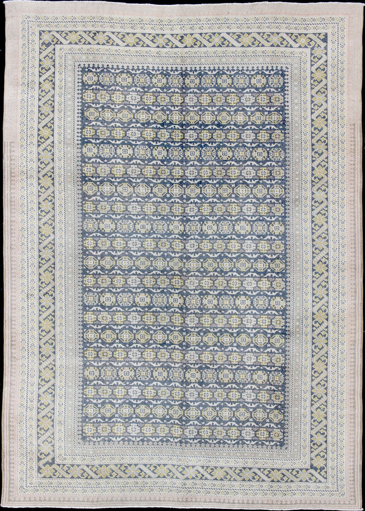 Antique Khotan Rug in Shades of Blue with Gray, L. Pink and Yellow Accents Antique Khotan rug in shades of blue, Taupe, gray, pink, and yellow, rug SUS - 2009 - 75, country of origin / type: Turkestan / Khotan, 1930 This attractive Khotan rug... - Keivan Woven ArtsSUS - 2009 - 75 - 13326