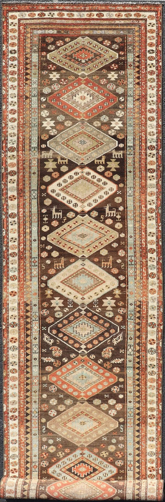 Long Persian Kurdish Runner with Medallion Design in Brown, Orange and Cream Antique Persian Kurdish long runner with tribal medallions, Keivan Woven Arts rug/SUS - 1908 - 115, country of origin / type: Iran or Kurdish, circa 1910. Long Persian Ku... - Keivan Woven ArtsSUS - 2012 - 660 - 14278Rug