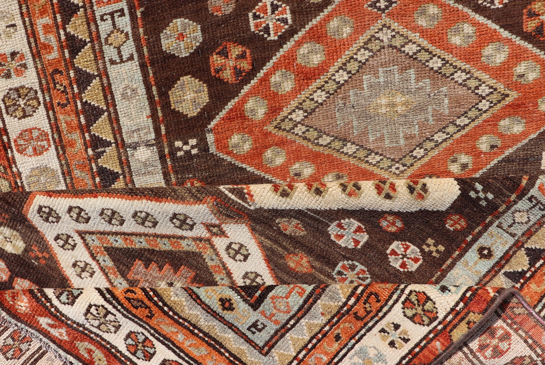 Long Persian Kurdish Runner with Medallion Design in Brown, Orange and Cream Antique Persian Kurdish long runner with tribal medallions, Keivan Woven Arts rug/SUS - 1908 - 115, country of origin / type: Iran or Kurdish, circa 1910. Long Persian Ku... - Keivan Woven ArtsSUS - 2012 - 660 - 14278Rug